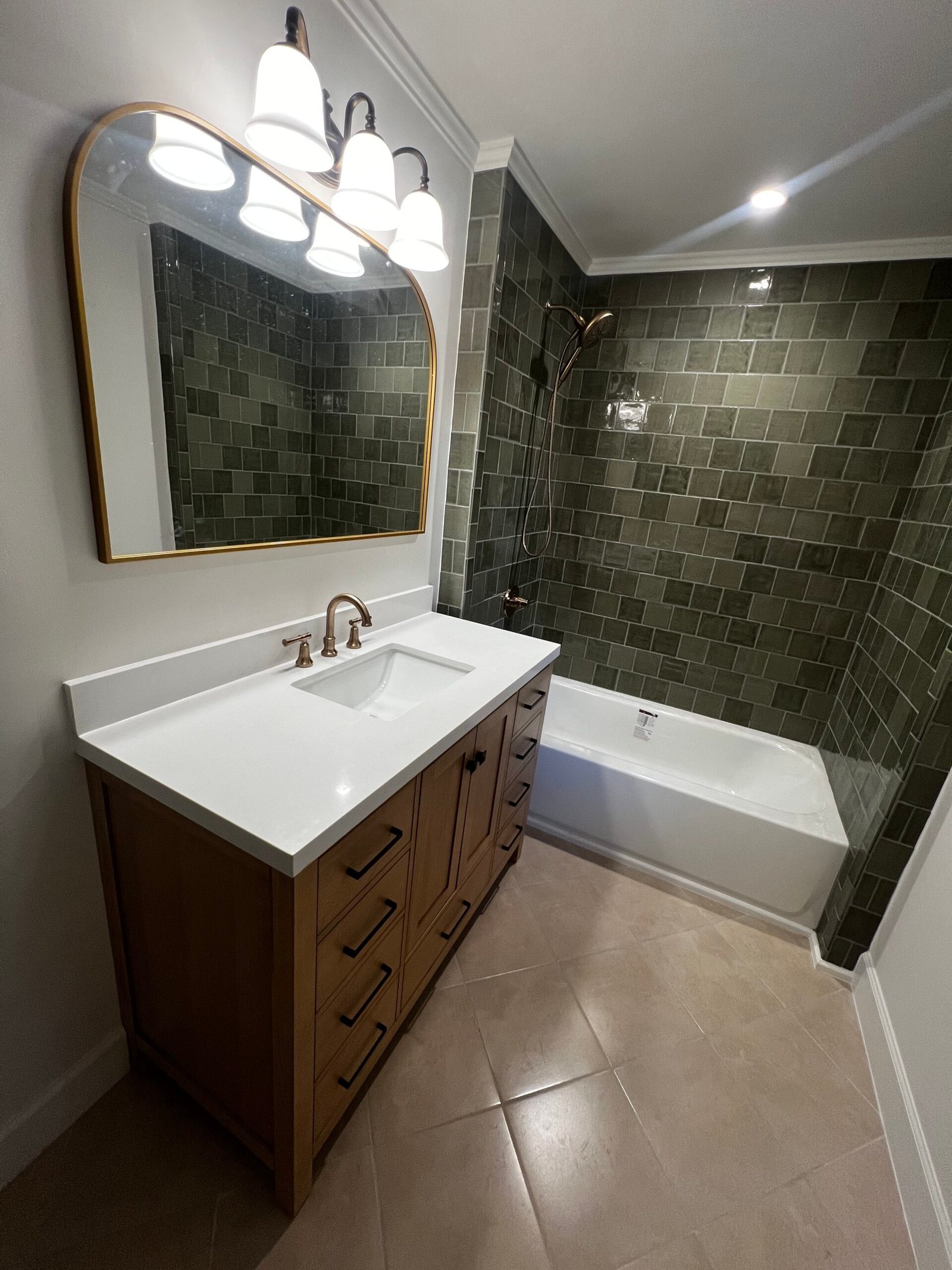 Modern bathroom vanity with mirror light - IAC Construction